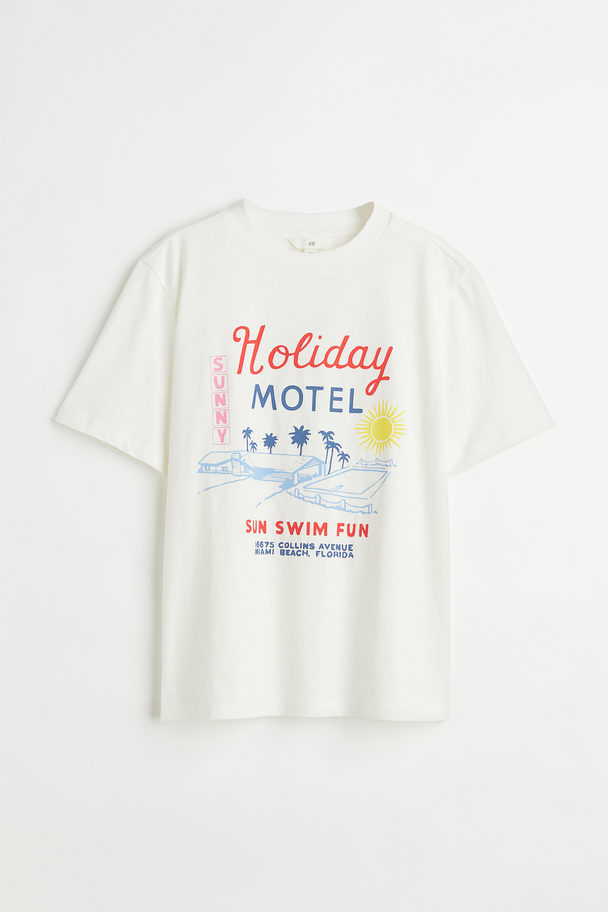 H&M T-Shirt aus Baumwolle Weiß/Holiday Motel