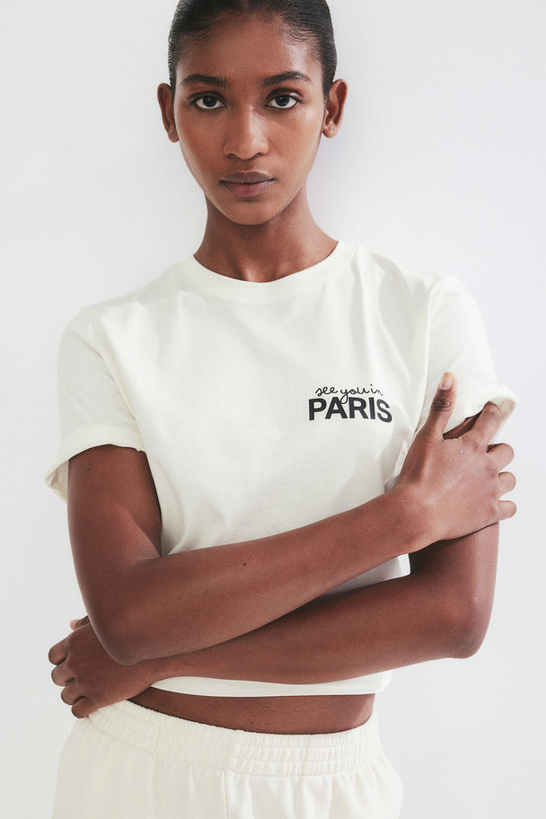 H&M T-Shirt aus Baumwolle Cremefarben/Paris