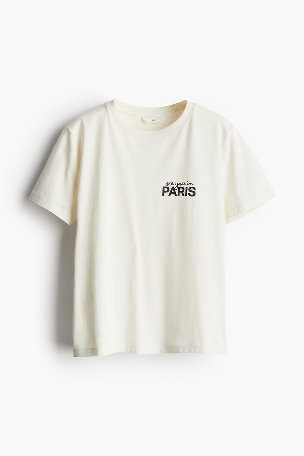 H&M T-Shirt aus Baumwolle Cremefarben/Paris