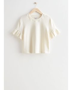 Embroidered Cuff Fleece Top White