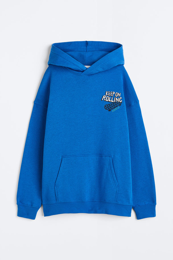 H&M Oversized Capuchonsweater Met Print Blauw/keep On Rolling