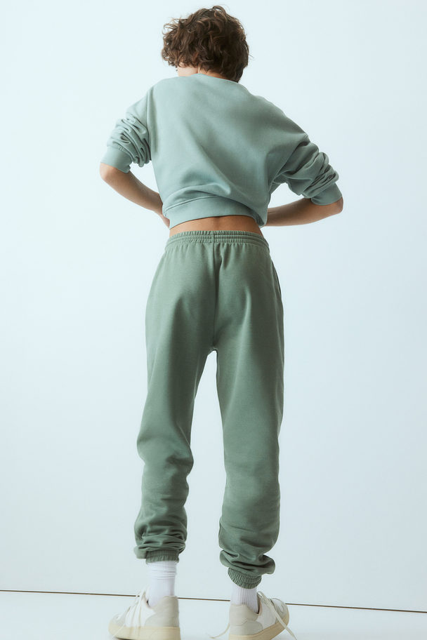 H&M Jogginghose mit hohem Bund Mattgrün