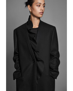 The Ruffled Tailored Wool Coat Black