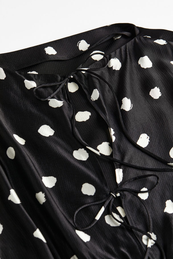 H&M Kleid mit Bindebändern Schwarz/Gepunktet
