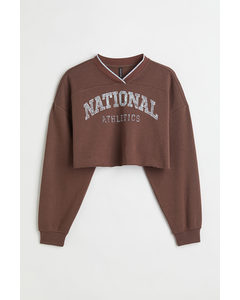 H&M+ Cropped Sweatshirt Dunkelbraun/National Athletics