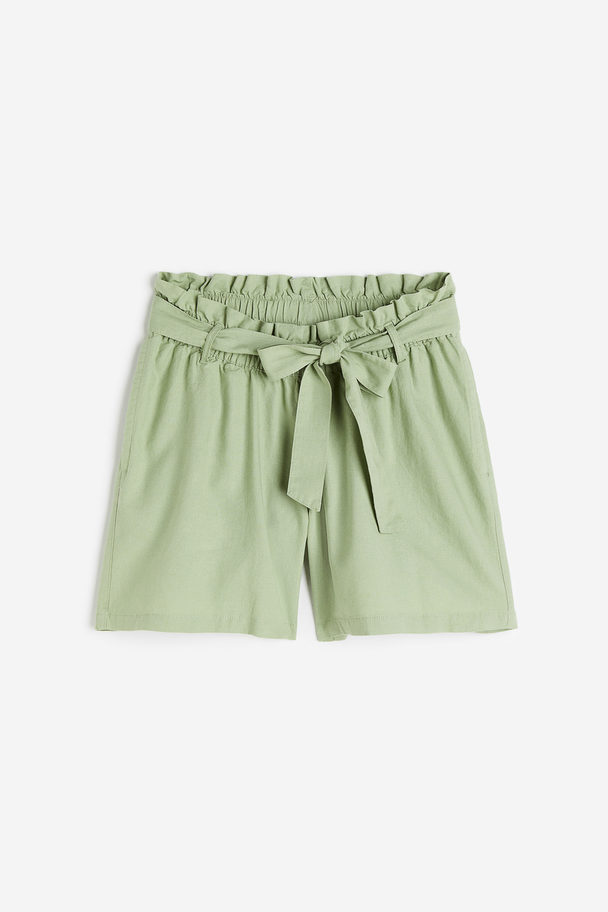 H&M Mama Shorts I Linmix Before & After Pistagegrön