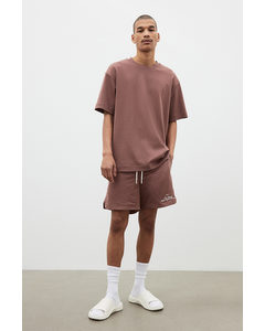 Mesh-Shorts in Regular Fit Ziegelrot