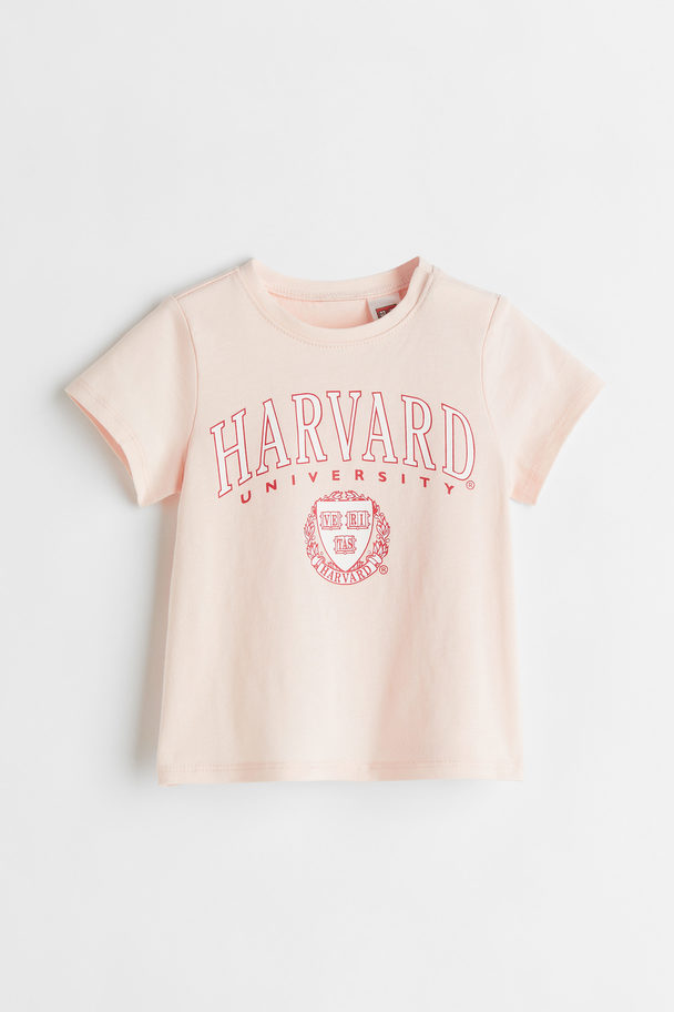 H&M T-Shirt mit Print Hellrosa/Harvard
