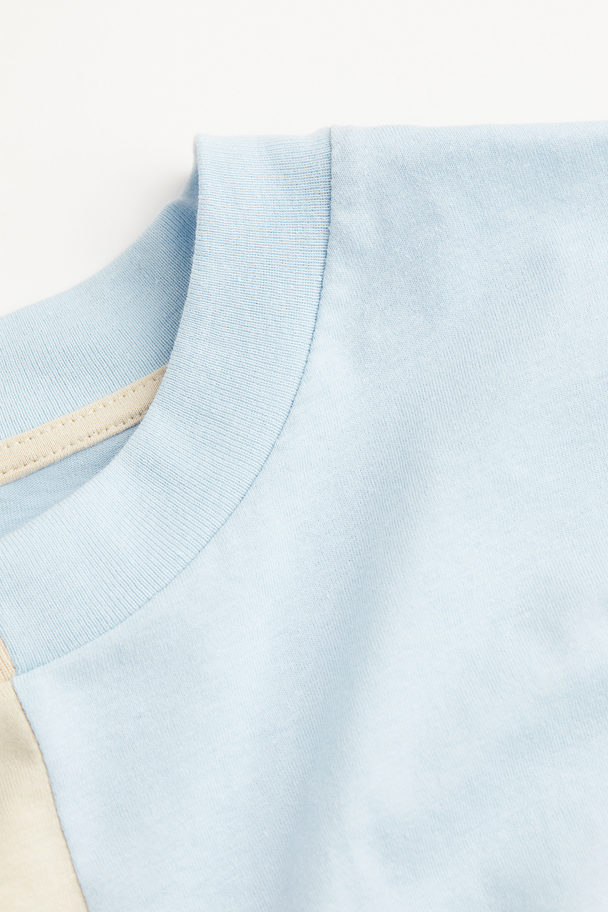 H&M Oversized T-shirtklänning Med Tryck Ljusblå/ljusbeige