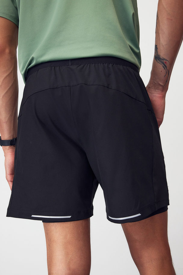 H&M DryMove™ Doppellagige Laufshorts Schwarz