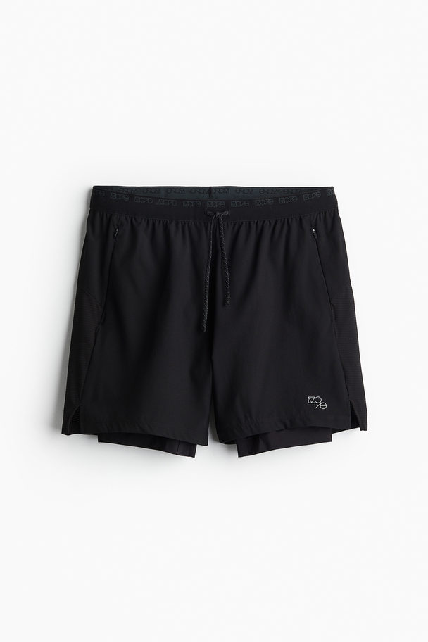 H&M DryMove™ Doppellagige Laufshorts Schwarz