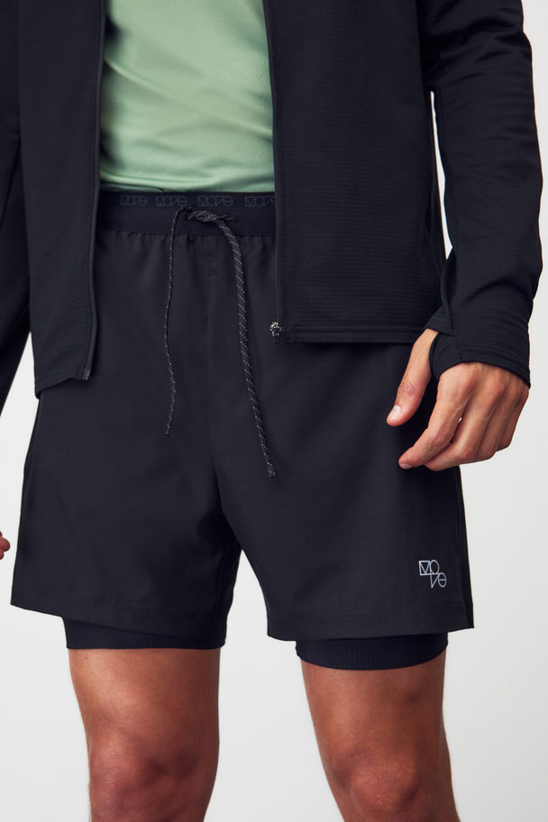 H&M DryMove™ Doppellagige Laufshorts Schwarz