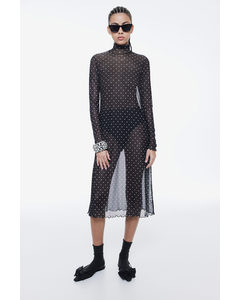Bodycon-Kleid aus Mesh mit Overlockdetails Schwarz/Gepunktet