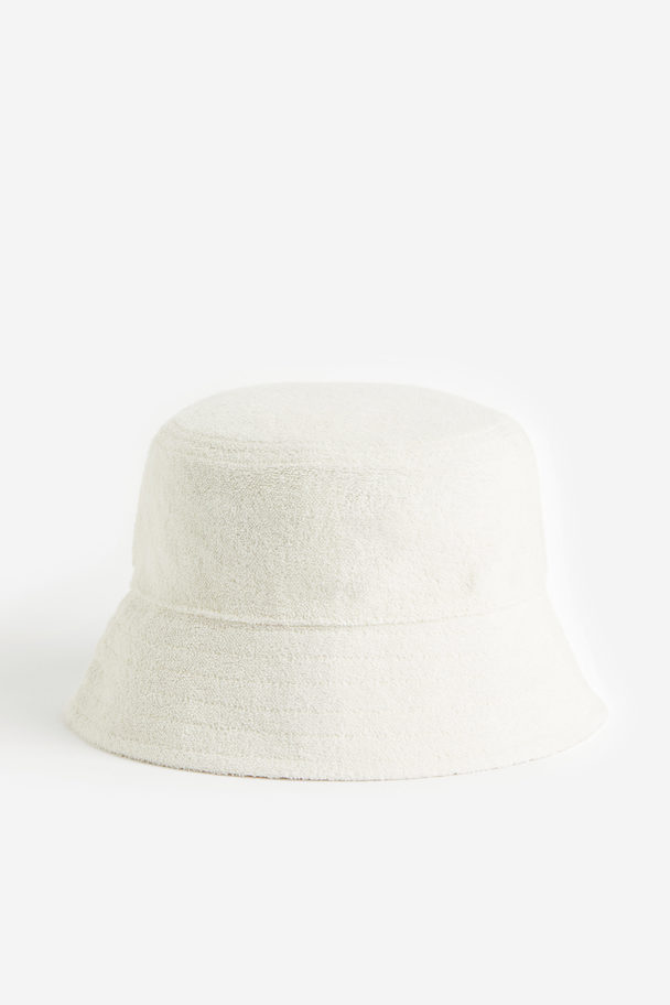 H&M Bucket Hat aus Frottee Cremefarben