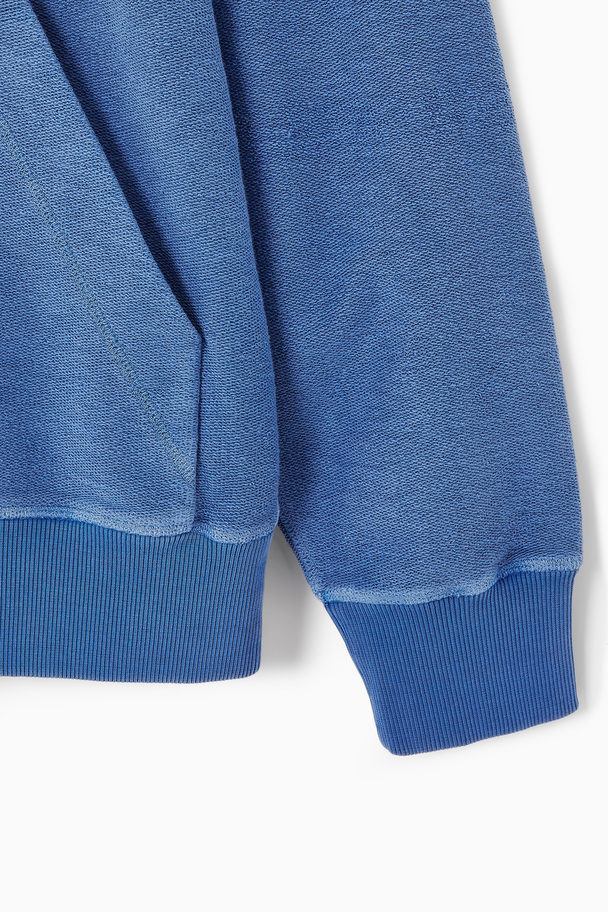 COS KAPUZENPULLOVER AUS FROTTEE Blau