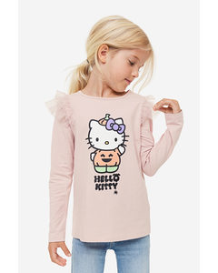 Bedrucktes Shirt mit Volants Hellrosa/Hello Kitty