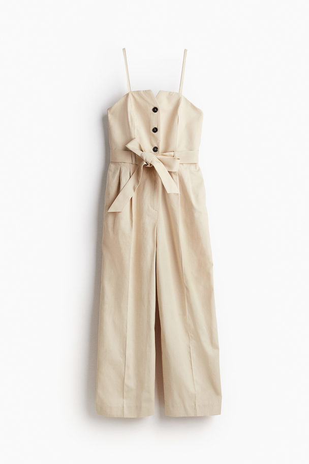 H&M Bandeau-Jumpsuit mit Bindegürtel Hellbeige