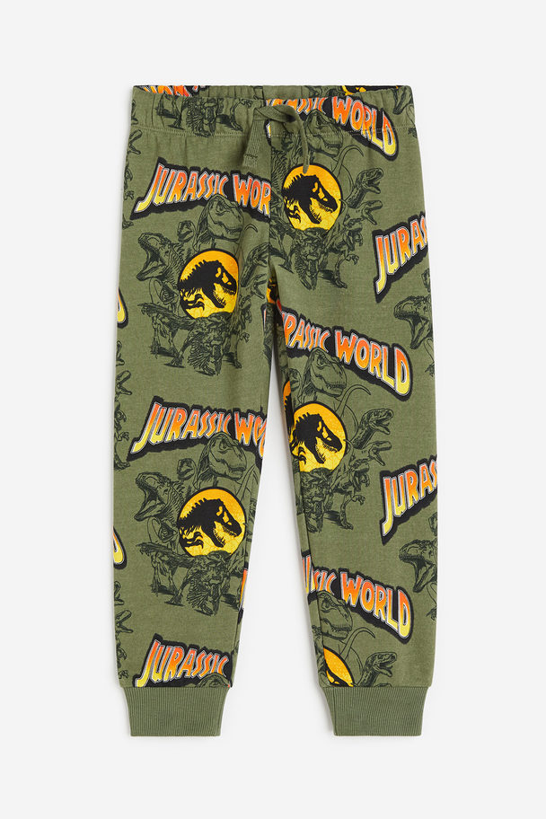 H&M Bedruckte Joggpants Khakigrün/Jurassic World